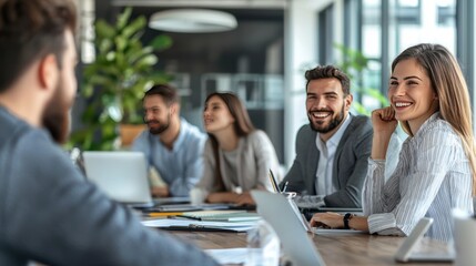 Business meeting colleagues smiling at each other