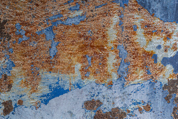 Rusty and Weathered Metallic Surface with Blue and Orange Texture