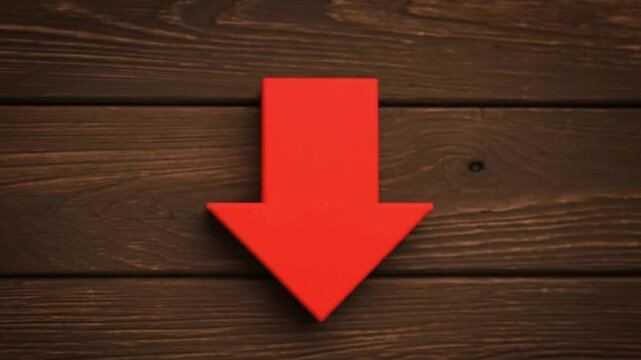 A red arrow pointing downwards is centered on a background of dark horizontal wood planks