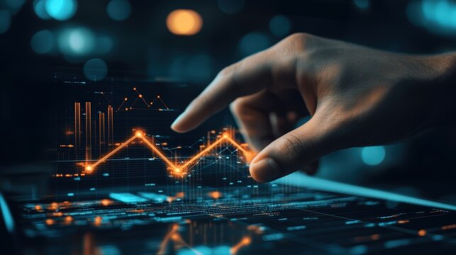 Hand interacting with futuristic glowing financial graph data on digital screen in dark setting