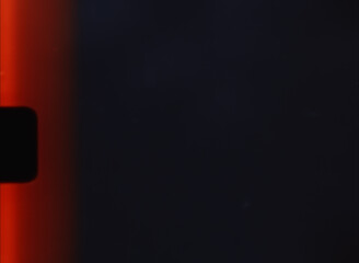 Old 8mm film light leaks background texture creating a retro vintage effect