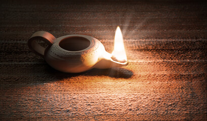 Ancient lamp shines in the dark