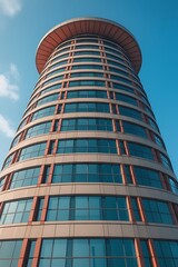 Sleek Cylindrical Skyscraper with Rounded Top and Tinted Glass Facade