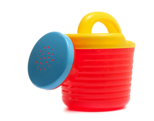 Plastic garden toy for kids, watering can isolated on white background