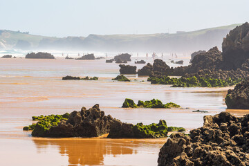 A beach of golden sand and rock formations of mind-blowing shapes in the north of Spain, Costa Quebrada.