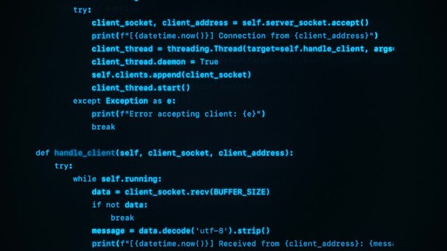 Dark computer screen with blue terminal interface showing running programming code. Coding, software development or cybersecurity concept