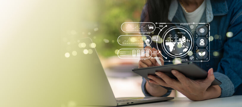 Woman analyzing digital sustainability data on tablet, with infographic of green technology, energy efficiency, eco innovation, environmental responsibility, and smart resource management system.