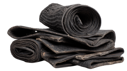 Worn-out rubber mats folded for recycling background isolated on a Transparent background, PNG file.