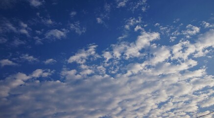 bright blue sky and dramatic white clouds