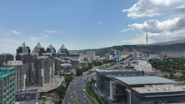 Al-Farabi Prospect in the business center of the Kazakh city of Almaty on a summer day