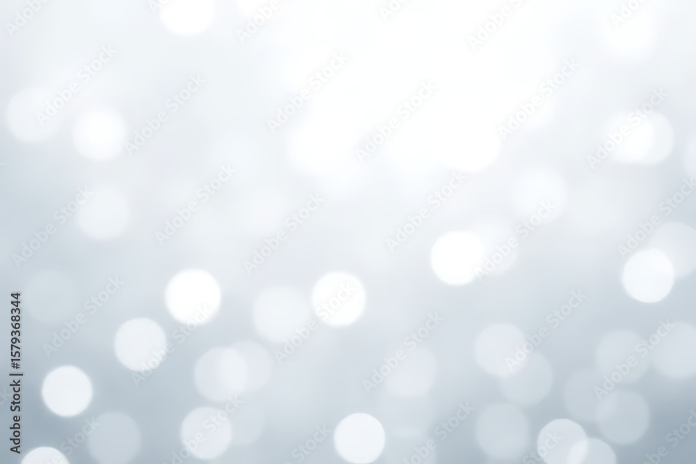 Poster soft focus background with blurred white and silver bokeh circles creating a dreamy and abstract vis