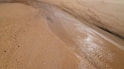 Flow in Wet Sand