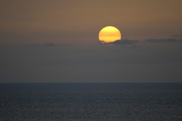 sunrise on the high seas seen from a cruise ship