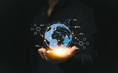 A businessman in a suit presenting a digital globe and connected lines, symbolizing global networking, digital innovation, and modern technology trends in business.