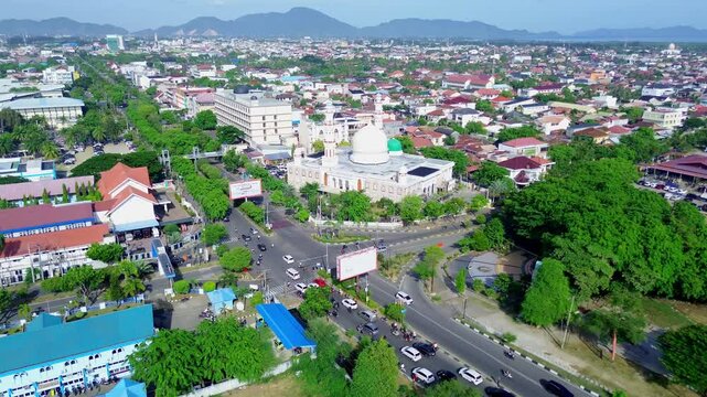 The green and neat streets of Banda Aceh city, showcasing the city's buildings
