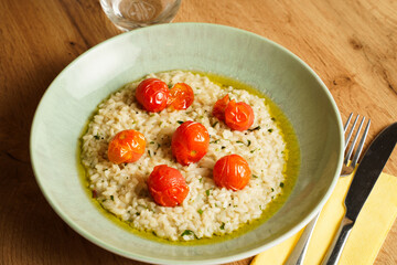 Creamy risotto with roasted cherry tomatoes