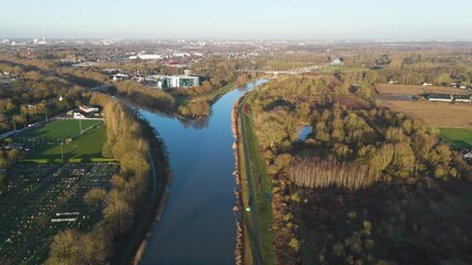 bridge melle countryside rural football pitch city ghent background sunshine enhances visual appeal river scheldt backward shot view of scenic 
