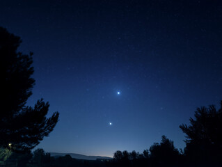 Naklejka premium Clear night sky with visible planets and stars