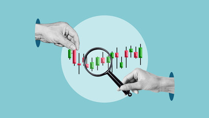 Candlestick trading chart and a hand holding a magnifying glass. Trading analytics concept....