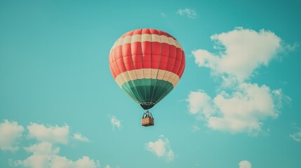 Fototapeta premium Hot air balloon soaring through a clear sky