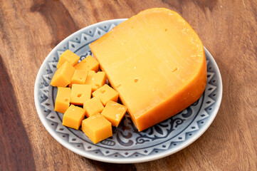 Cheese collection, Dutch ripe hard chees made from cow milk in the Netherlands in piece and in blocks close up