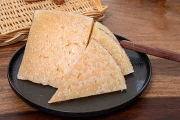 Very old anejo tostado Spanish hard cheese, cow and sheep curado, manchego, goat cheese close up