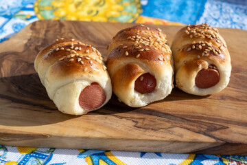Fresh baked bread, pizza, focaccia or pizzetta with tomatoes, vegetables, sausage and cheese,...