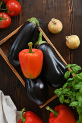 fresh organic vegetables on a wooden background, flat lay