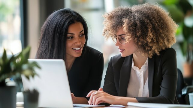Project discussion in office by business womans professionals using laptop together, working on corporate business solution