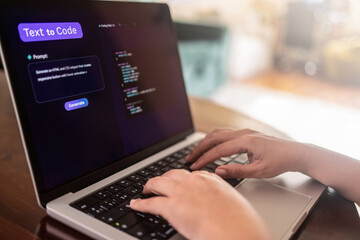 AI programming assistant, hands using text to code interface on laptop for generative software development in modern workspace