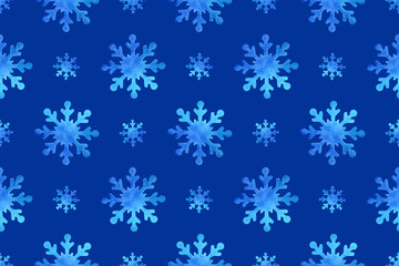 Seamless pattern with watercolor snowflakes on a blue background. Winter watercolor background.