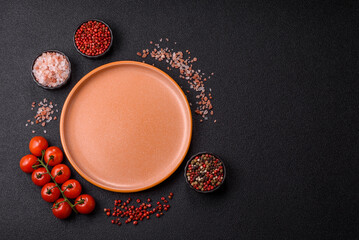 Empty ceramic plate on a monochrome brown background. Empty plate