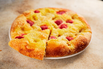 Sweet pie raspberry  frangipane dessert baking fresh delicious gourmet food background on the table rustic food top view copy space