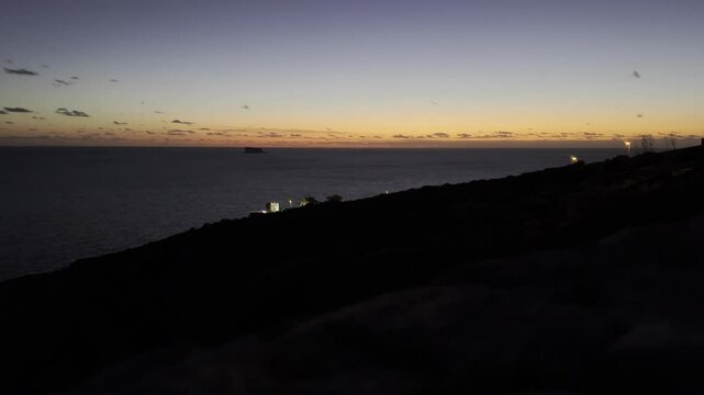 Colorful sunset over filfla from dingli cliffs, malta