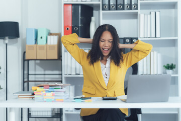 Stress at Work: A woman in yellow blazer shows a relatable moment of workplace stress, capturing...