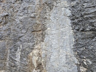 Naklejka premium feuchte Steinmauer Hintergrund