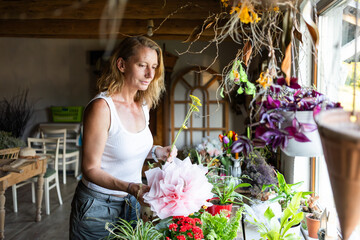 woman working in her flower shop
