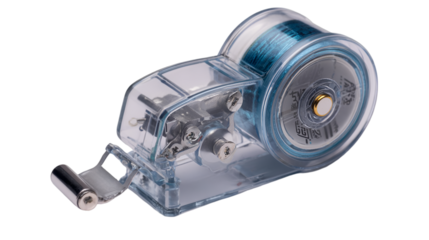 Close up of a clear plastic tape dispenser with blue tape and metal components on a black background