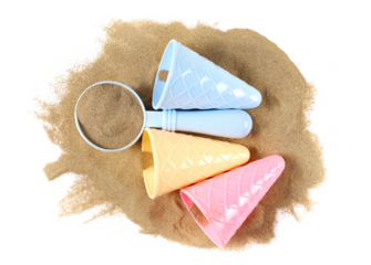 Set plastic garden toy for kids, ice cream cones and spoon in sand isolated on white background, top view