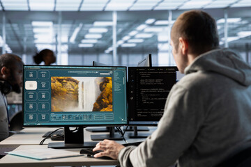 Technician in server hub making AI software turning text prompt into photos. Data center employee...