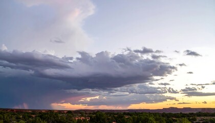 Stormy sunset over desert landscape