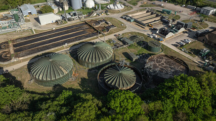 Overhead shot of a wastewater treatment facility, showcasing its complex infrastructure and...