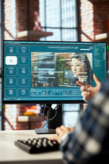 Man in home office using generative artificial intelligence website generating videos using...