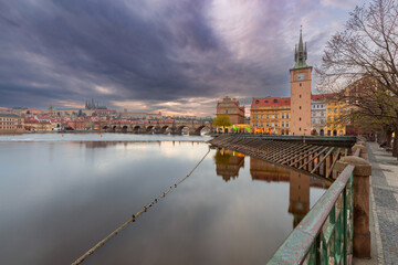 Fototapeta premium Charles Bridge and Old Water Tower in Prague, Czech Republic
