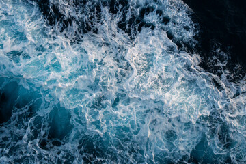 Sea water splash with foamy wave. Water surface texture. Tropical islands ferry travel. Cruiseliner...