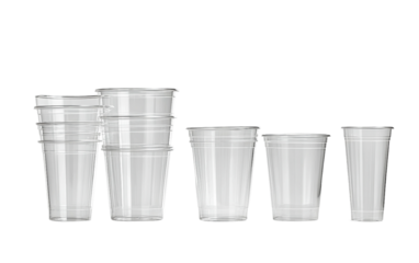 Assorted compostable transparent PLA cups arranged in various sizes for ecofriendly beverage serving and takeaway use isolated on transparent background PNG