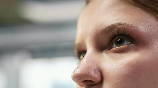 Extreme close up of female engineer using AI LLM chatbot, optimizing company systems performance. System administrator uses artificial intelligence to convert manual workflows into automated scripts
