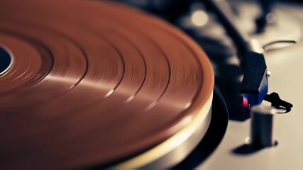 Closeup of a spinning vinyl record on a turntable with tonearm and stylus in motion - Powered by Adobe