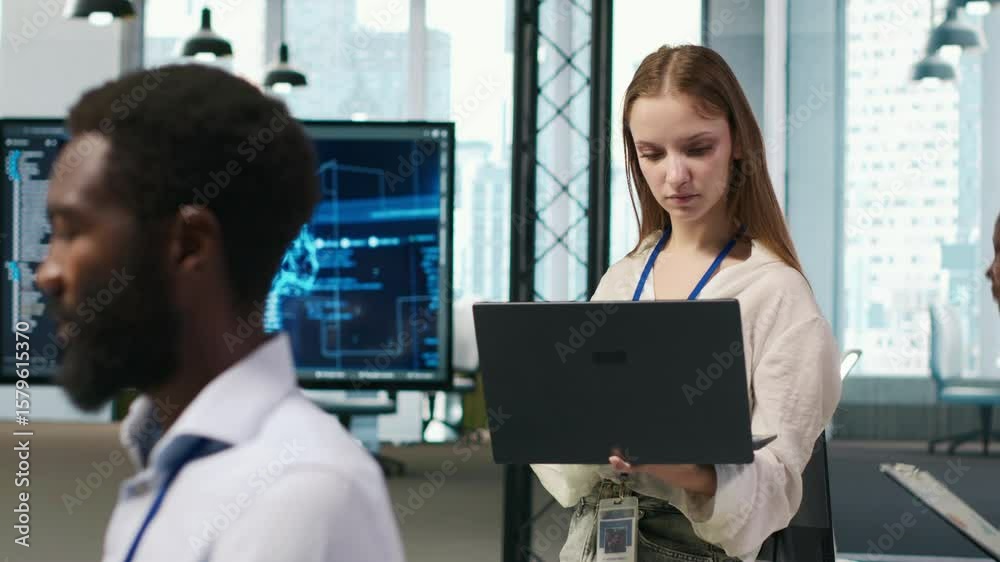 Fototapete portrait of young smiling female programmer in office automating repetitive tasks using ai scripts. 