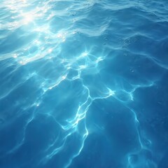 Fototapeta premium Clear blue water surface texture with ripples and bubbles. Sun light reflects on liquid, creating shimmering patterns. Pure transparent turquoise waves create a refreshing, clean aquatic background.